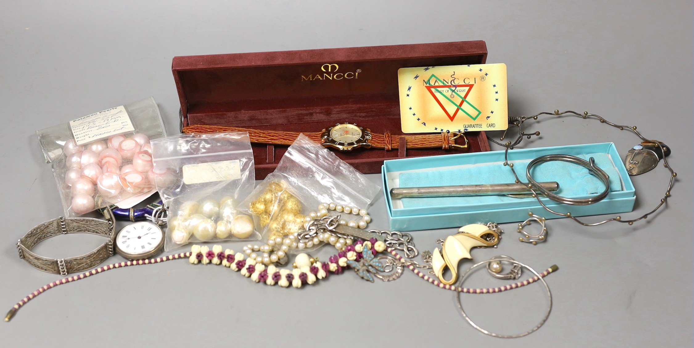 Mixed costume jewellery including filigree bracelet, bangles etc. and other items including two pens and a fob watch.
